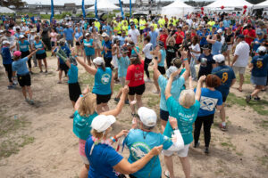 Group of people dancing at 2024 Dragon Boat Fesitval
