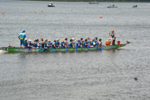 One boat full of people in the water at 2024 Dragon Boat Festival