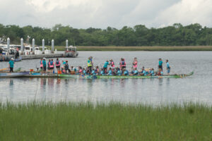 Two boat preparing to race at the 2024 Dragon Boat Festival